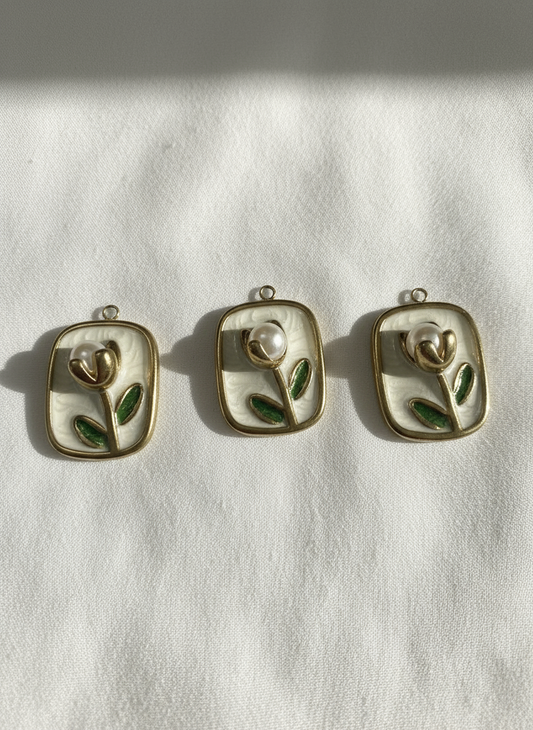 White Enamel Flower With Gold Trim Charm